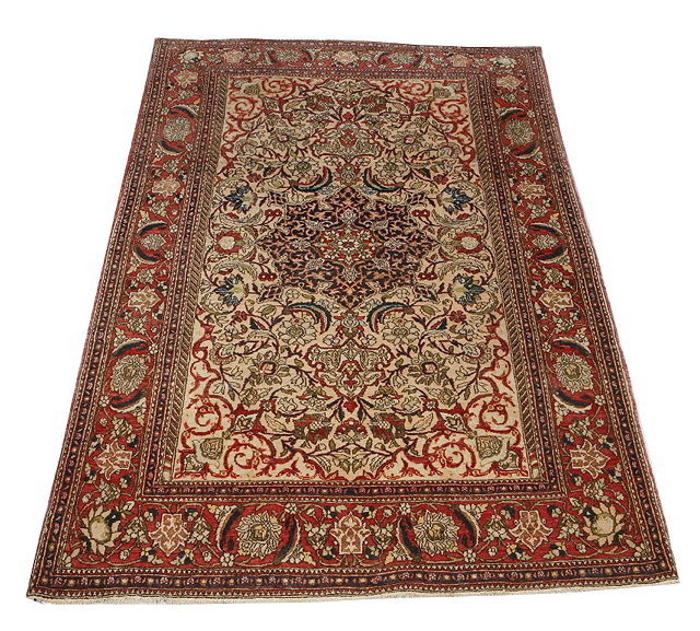 Appraisal: AN ISPHAHAN RED GROUND RUG the central rose medallion within