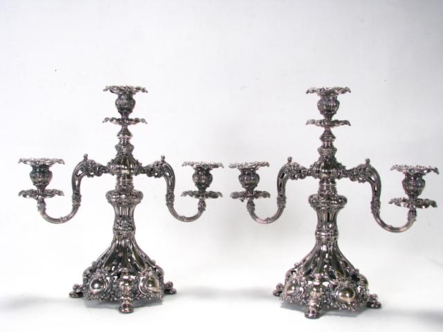 Appraisal: Pair of ornate Victorian silver plate three branch candelabrum