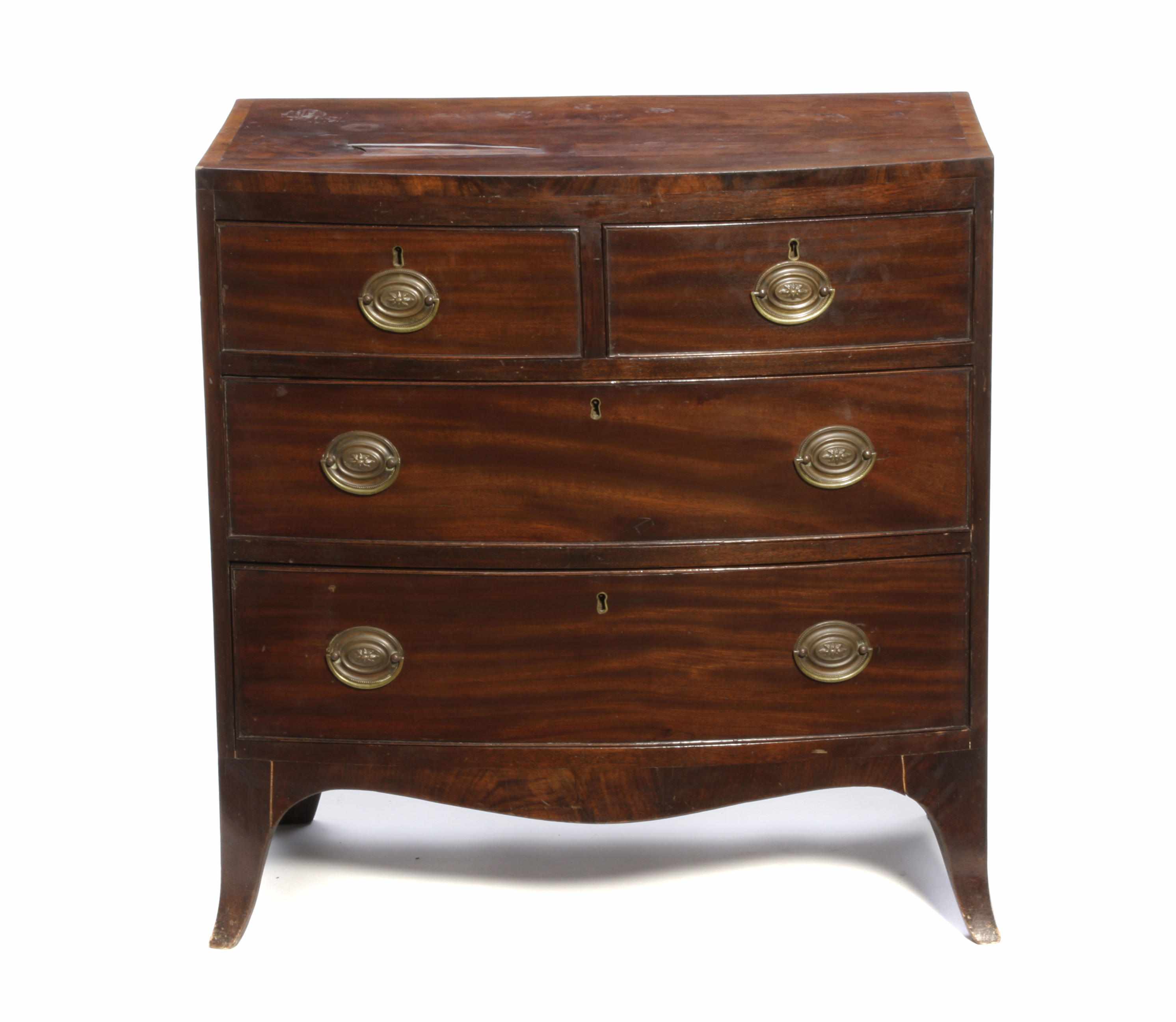 Appraisal: A George III mahogany bow front chest of drawers late