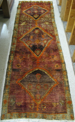 Appraisal: PERSIAN KURD RUNNER three geometric medallions and overall stylized floral