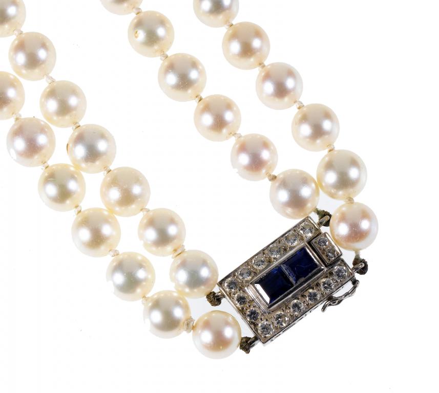 Appraisal: A CULTURED PEARL DOUBLE-ROW NECKLACE the rectangular clasp with two