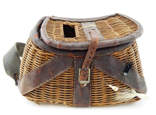 Appraisal: Vintage wicker fishing creel bound with wide leather straps hinged