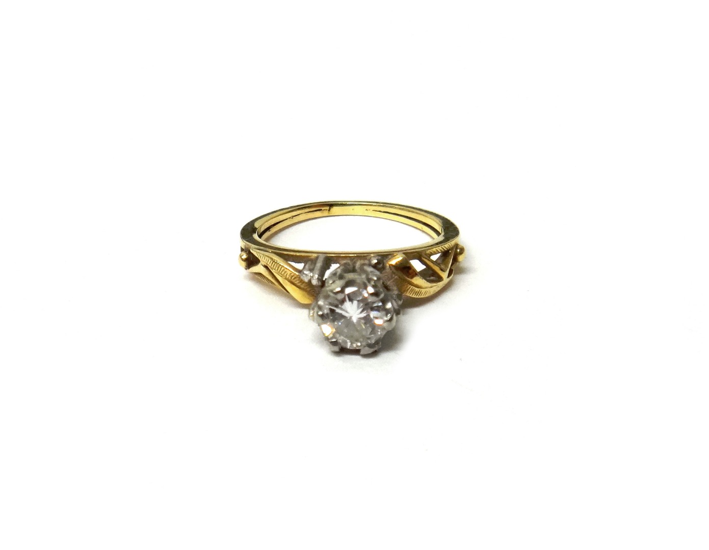 Appraisal: A gold and diamond set single stone ring claw set