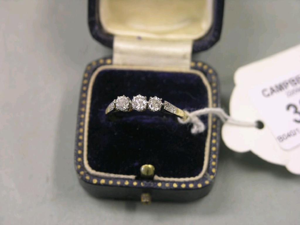 Appraisal: An ct gold three stone diamond ring three claw set