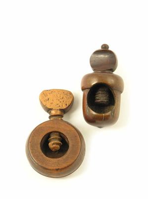 Appraisal: An th century treen nutcracker modelled as an acorn with