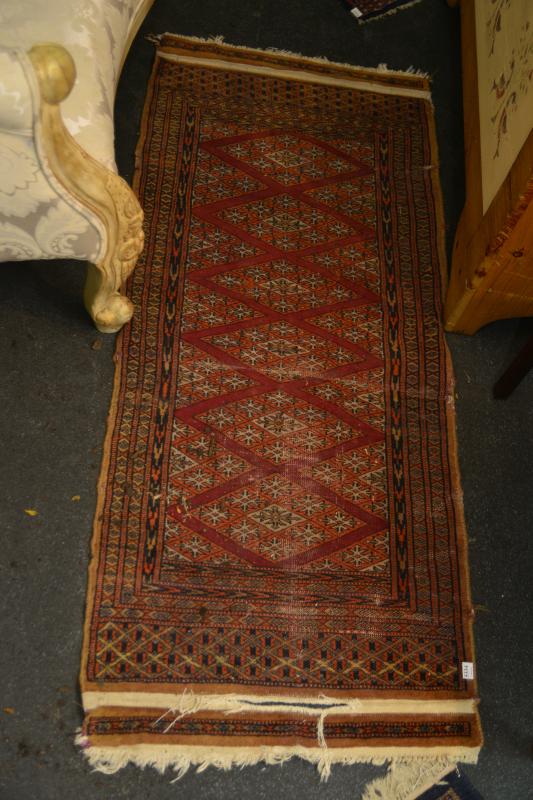 Appraisal: AN AUTHENTIC PERSIAN RUG IN RUST AND BLUE TONES A