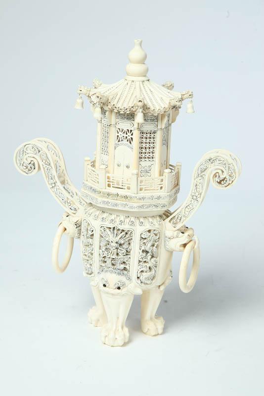 Appraisal: IVORY CARVING China th century Temple jar with pagoda lid