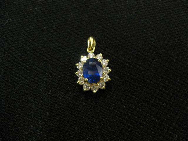 Appraisal: Sapphire Diamond Pendant carat rich blue gem surrounded by diamonds