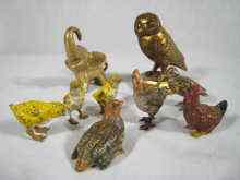 Appraisal: A group of seven miniature cold painted bronze birds including