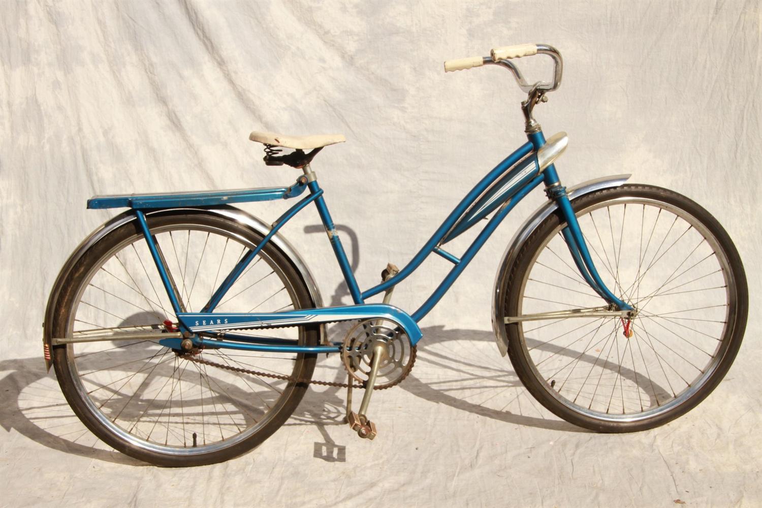 Appraisal: Sears girls bicycle blue white and chrome with dual light