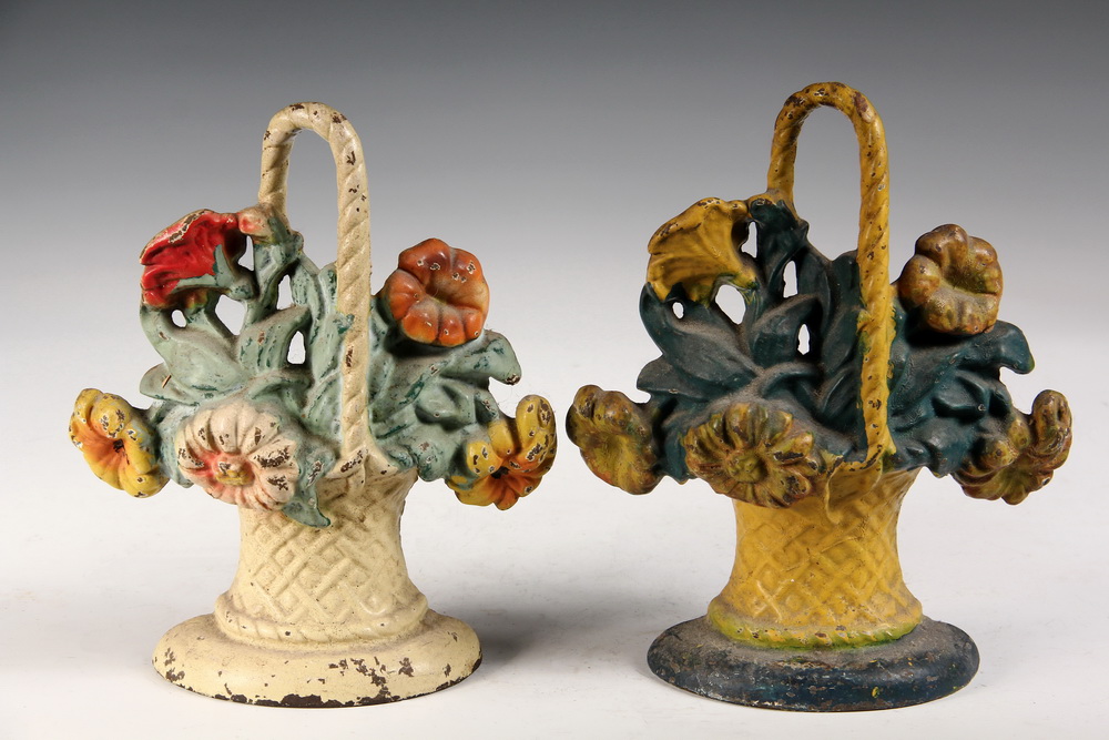 Appraisal: PAIR OF CAST IRON DOORSTOPS - Painted Iron Door Stops