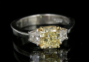 Appraisal: A Fancy Yellow Diamond Ring Set in Platinum One platinum