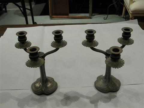 Appraisal: PAIR OF CONTINENTAL SILVERPLATED CANDLESTICKS Possibly Christofle fashioned in the