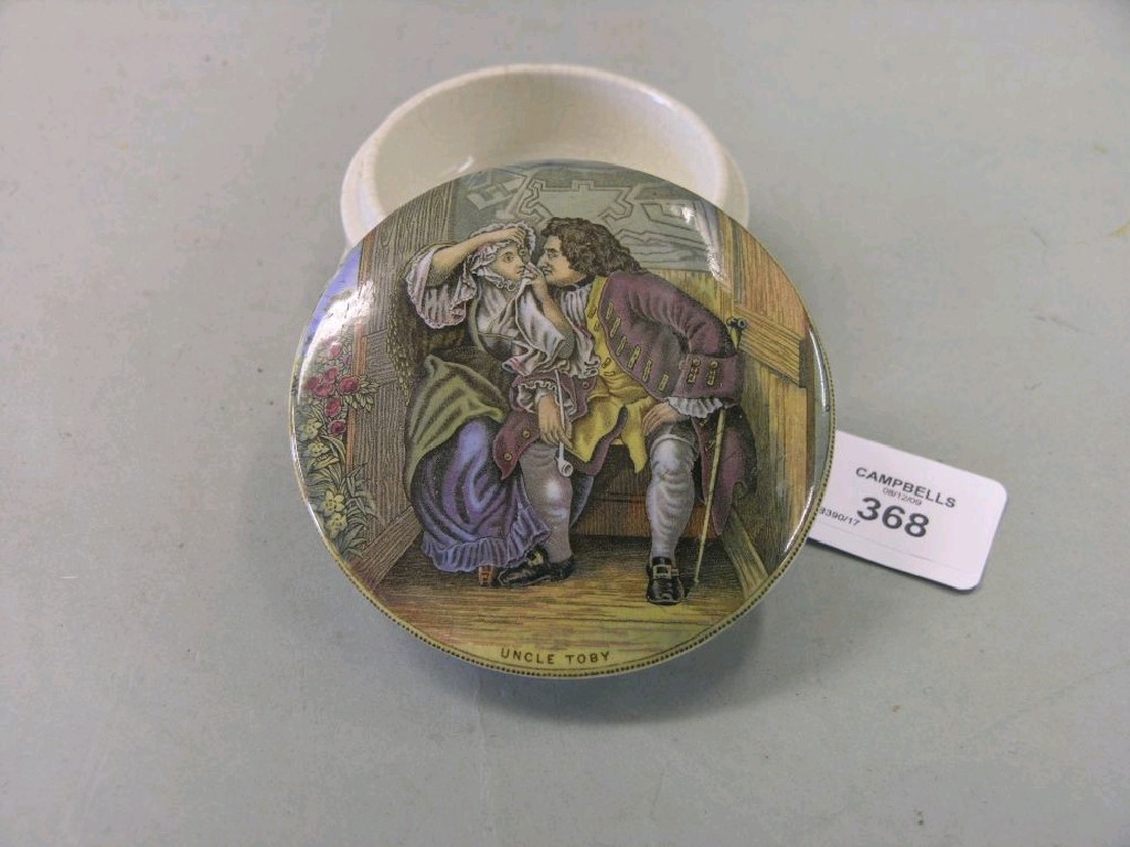 Appraisal: A Victorian pot lid 'Uncle Toby' with pot