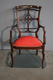 Appraisal: A single Victorian mahogany and upholstered armchair damaged