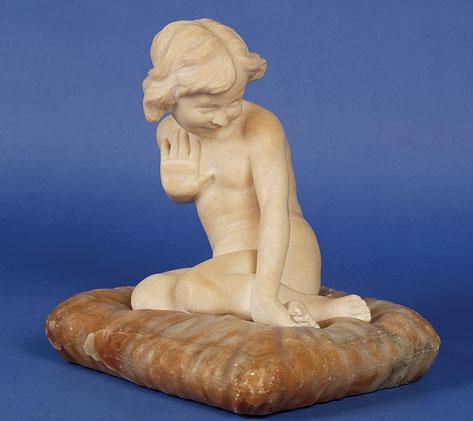 Appraisal: AN ALABASTER FIGURE OF A NAKED CHILD seated on a