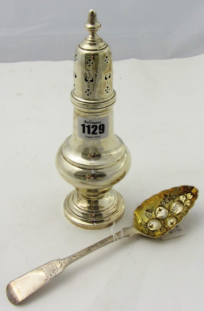 Appraisal: A silver baluster shaped sugar caster on a circular foot