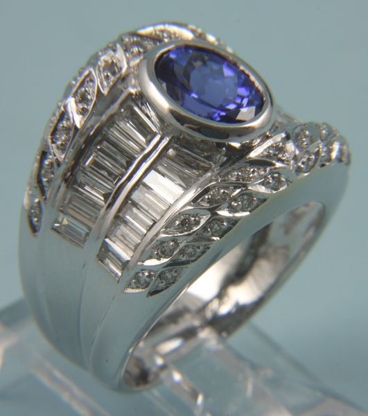 Appraisal: kt gold ring with tanzanite and diamonds kt ring with