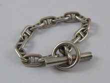 Appraisal: A heavy white metal marked silver Gucci style bracelet Approx