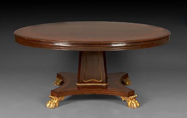 Appraisal: An imposing Regency style parcel gilt inlaid mahogany center table