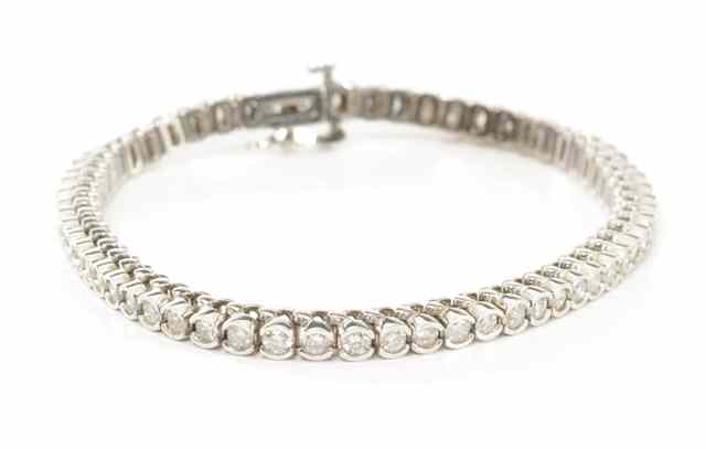 Appraisal: DIAMOND AND EIGHTEEN KARAT GOLD BRACELET The white gold bracelet