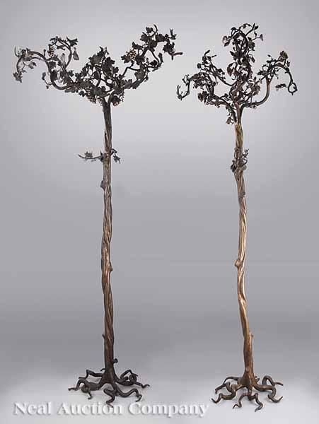 Appraisal: A Pair of Art Nouveau Polychromed Bronze Conservatory Tree Floor