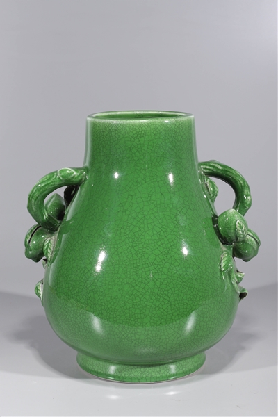 Appraisal: Chinese green crackle glazed porcelain vase with molded peach form