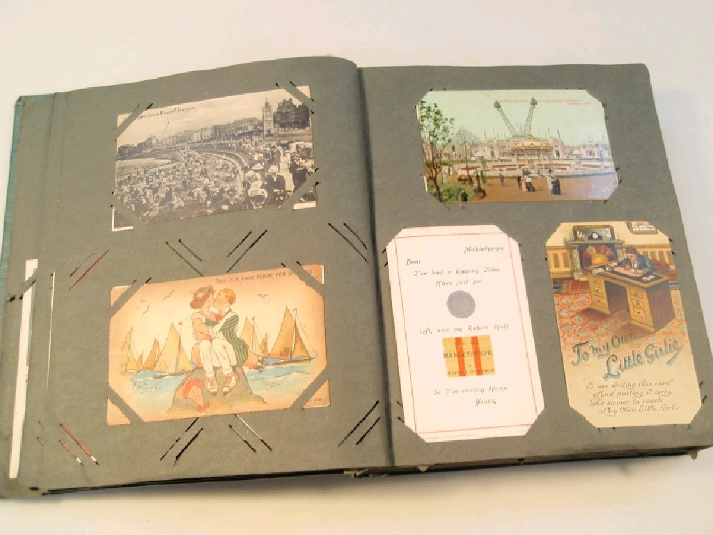 Appraisal: An Early thC Postcard Album containing approx cards including humour