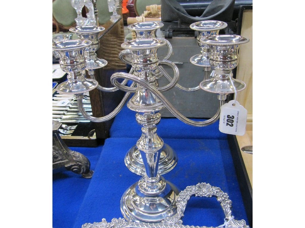 Appraisal: Pair of silver plate three branch candelabra