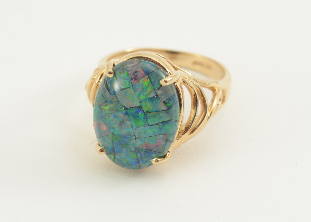 Appraisal: OPAL MOSAIC TRIPLET RING Centering one x mm opal mosaic