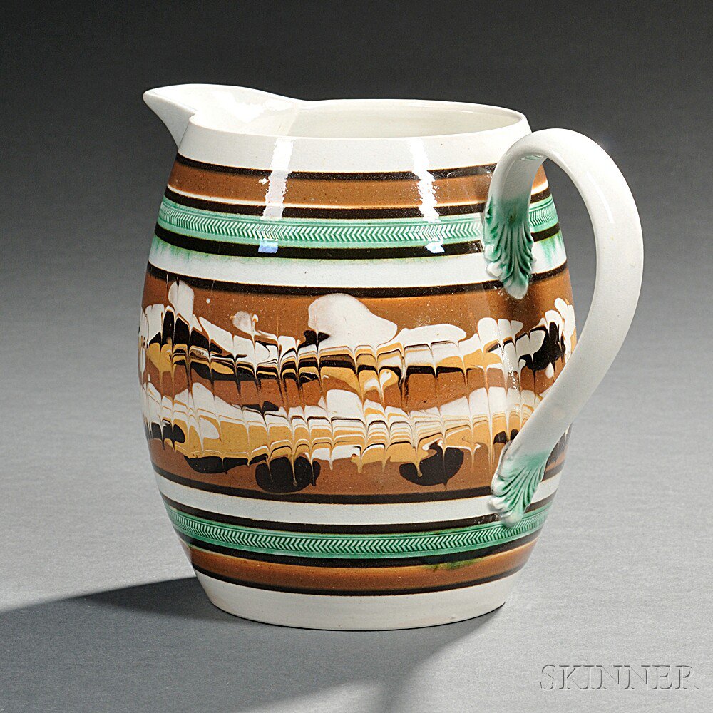 Appraisal: Mocha-decorated Pearlware Pitcher England early th century the barrel-form pitcher