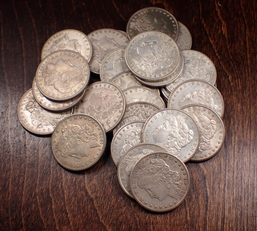 Appraisal: TWENTY-FIVE U S SILVER MORGAN DOLLARS -S -S -S -S