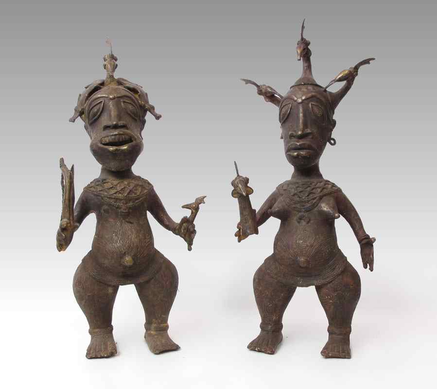 Appraisal: PAIR AFRICA TIKAR FIGURES WITH HEAD DRESS SCULPTURE Woman ''