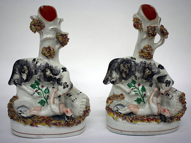 Appraisal: A PAIR OF TH CENTURY STAFFORDSHIRE POTTERY FLAT BACK VASES