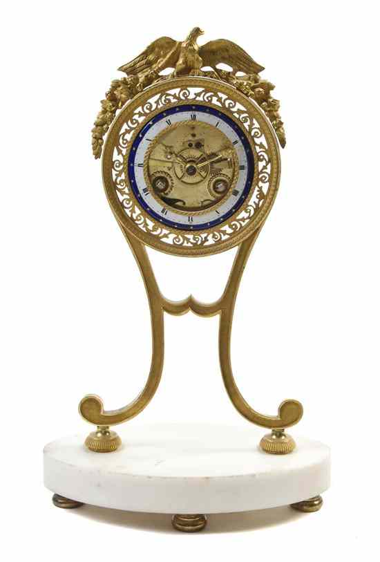 Appraisal: A French Gilt Bronze and Marble Clock having an eagle