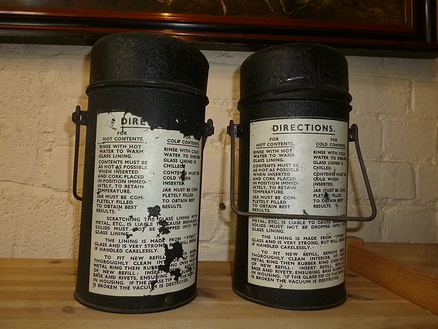 Appraisal: A BLACK PAINTED THERMOS FLASK with clear directions for use