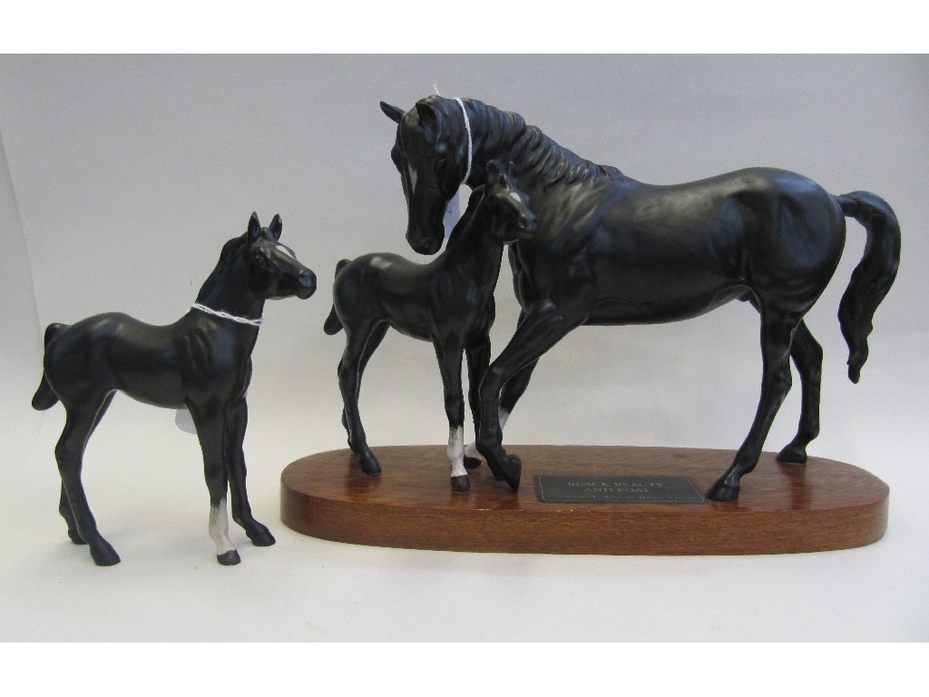 Appraisal: Beswick group Black Beauty and foal and another foal