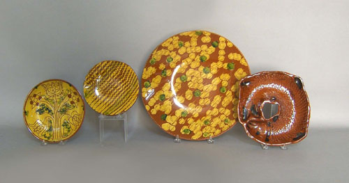 Appraisal: Breininger redware charger dia together with two pie plates dia