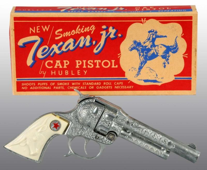 Appraisal: Hubley Texan Jr Smoking Toy Cap Gun Description Includes original