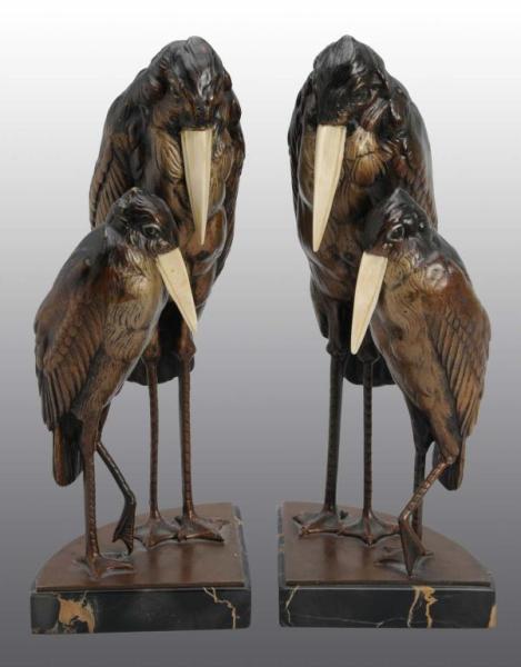 Appraisal: Pair of Bronze Ivory Bookends Description Austrian Signed B NTMAN