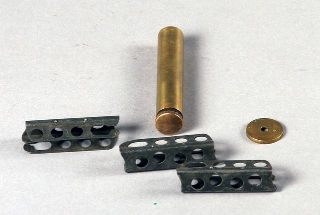 Appraisal: SMLE clips unit stock marking disk blank and brass oiler