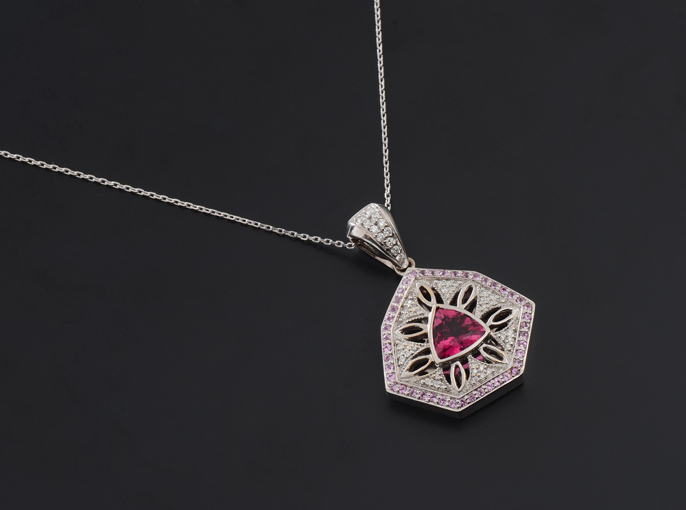 Appraisal: K RUBELLITE DIAMOND SAPPHIRE PENDANT K white gold pendant centering