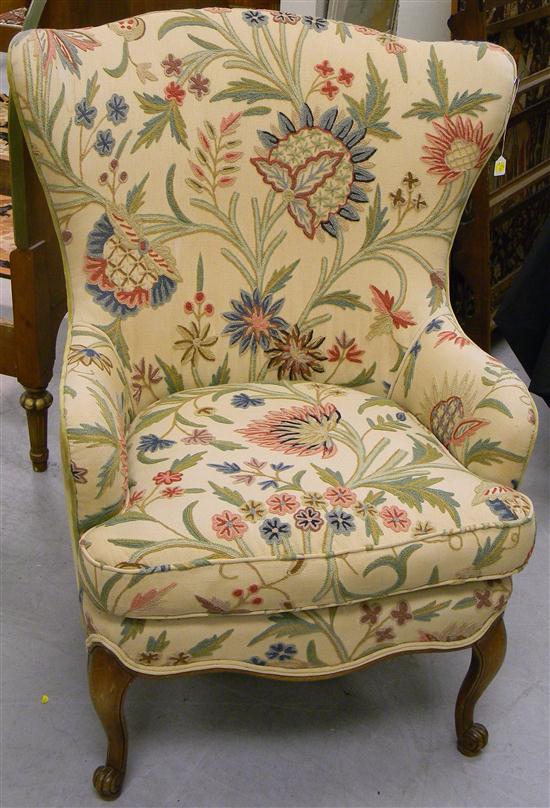 Appraisal: Crewel upholstered armchair shaped skirt cabriole legs scrolled feet some