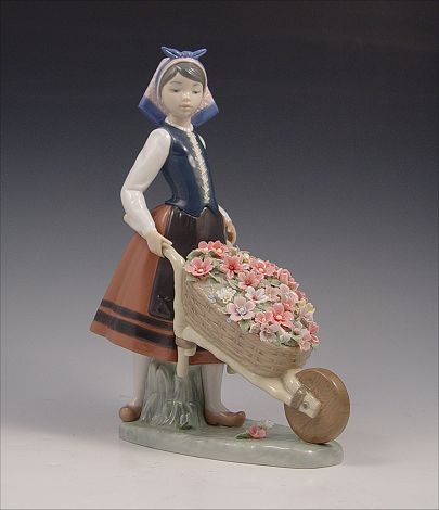 Appraisal: LLADRO A BARROW OF BLOSSOMS Retired in Girl with a