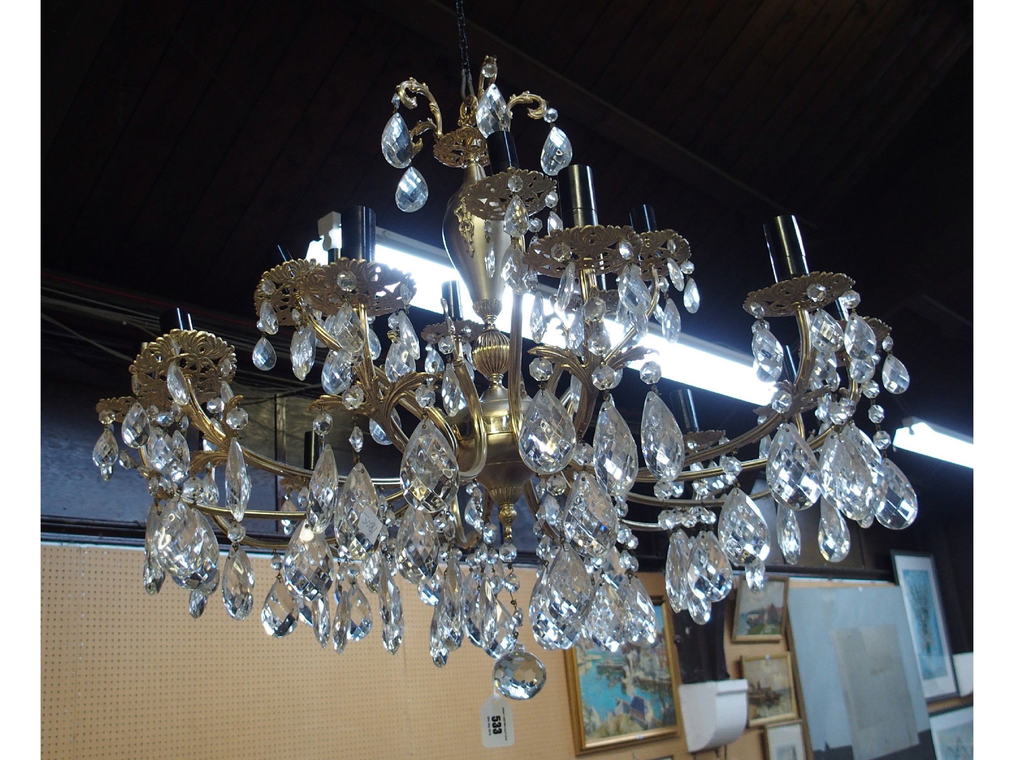 Appraisal: Multi arm chandelier with facet cut drop