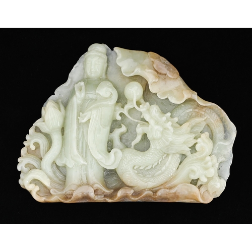 Appraisal: A Chinese jade boulder carving of Guanyin and a dragon