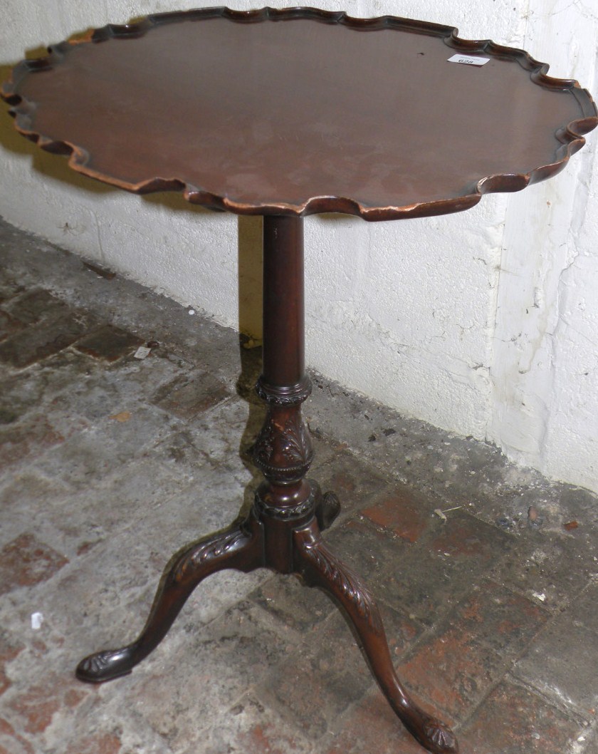 Appraisal: A mahogany Chippendale design pedestal table the carved top with