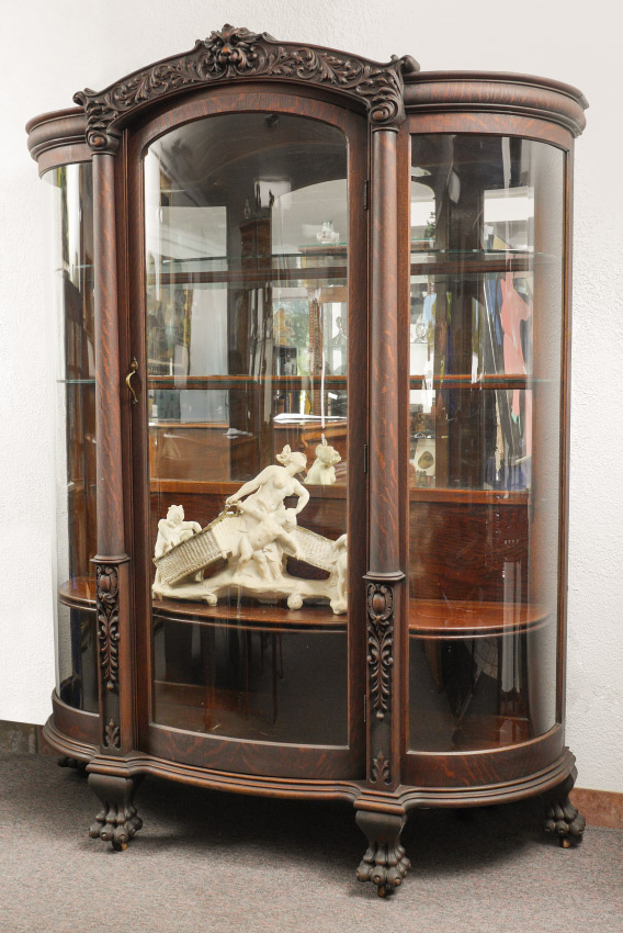 Appraisal: HORNER OAK TRIPLE BOW CHINA CABINET Attributed to RJ Horner