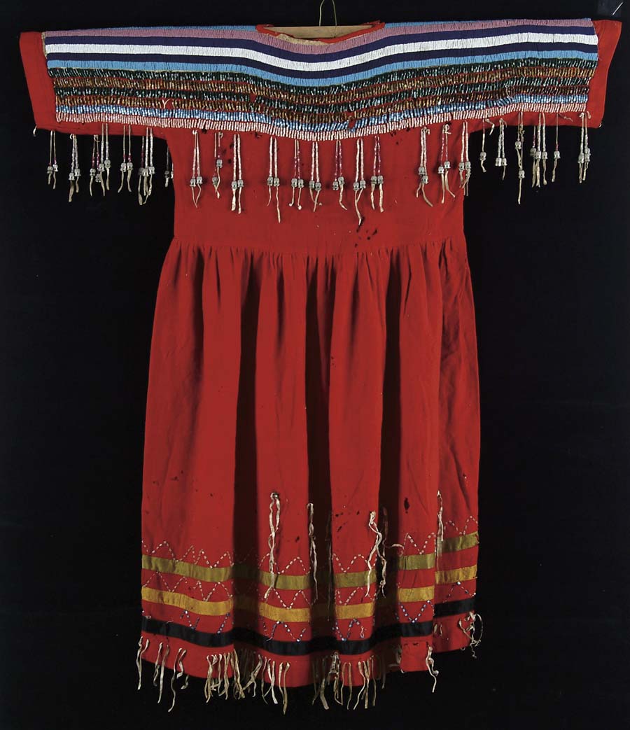 Appraisal: DRESS BLACKFOOT LATE TH CENTURY Red trade cloth body short