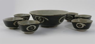 Appraisal: Warwick Parker born a stoneware dessert set resist decorated in